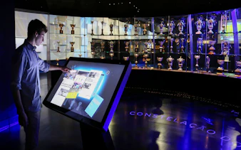 Interactive display at FC Porto Museum with trophy exhibit in Porto.