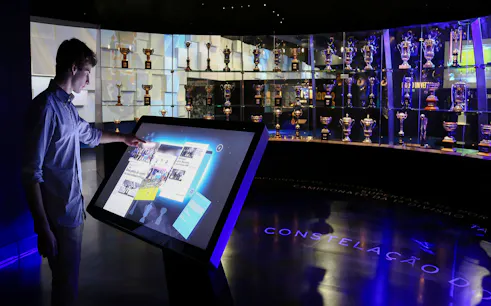 Interactive display at FC Porto Museum with trophy exhibit in Porto.
