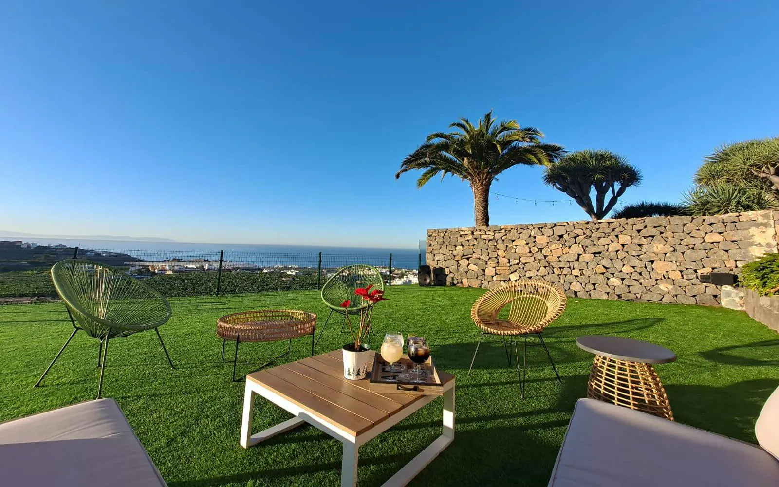 Outdoor seating area with ocean view at Banana World, Gran Canaria.