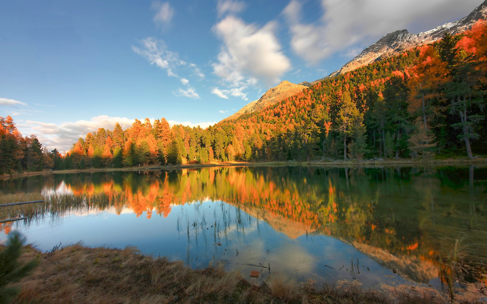 Lej Nair in engadine valley in an autumn landscape