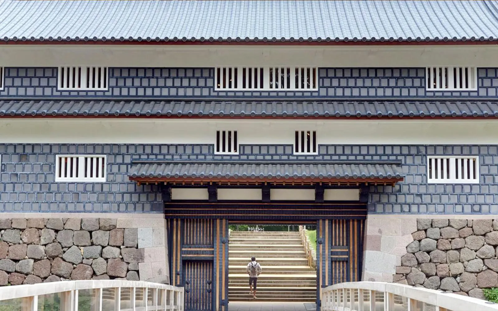 Kanazawa Castle gate with stone walls and traditional architecture.