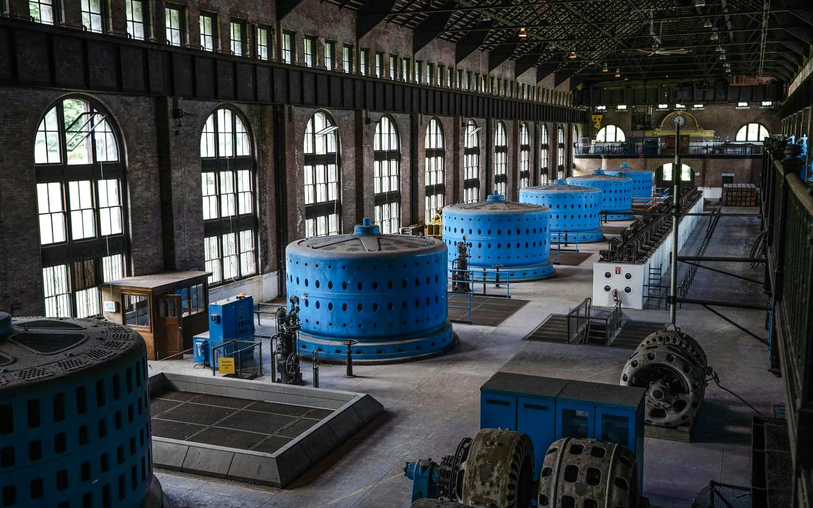 Underground power station interior with blue generators at Niagara Falls, Canada.