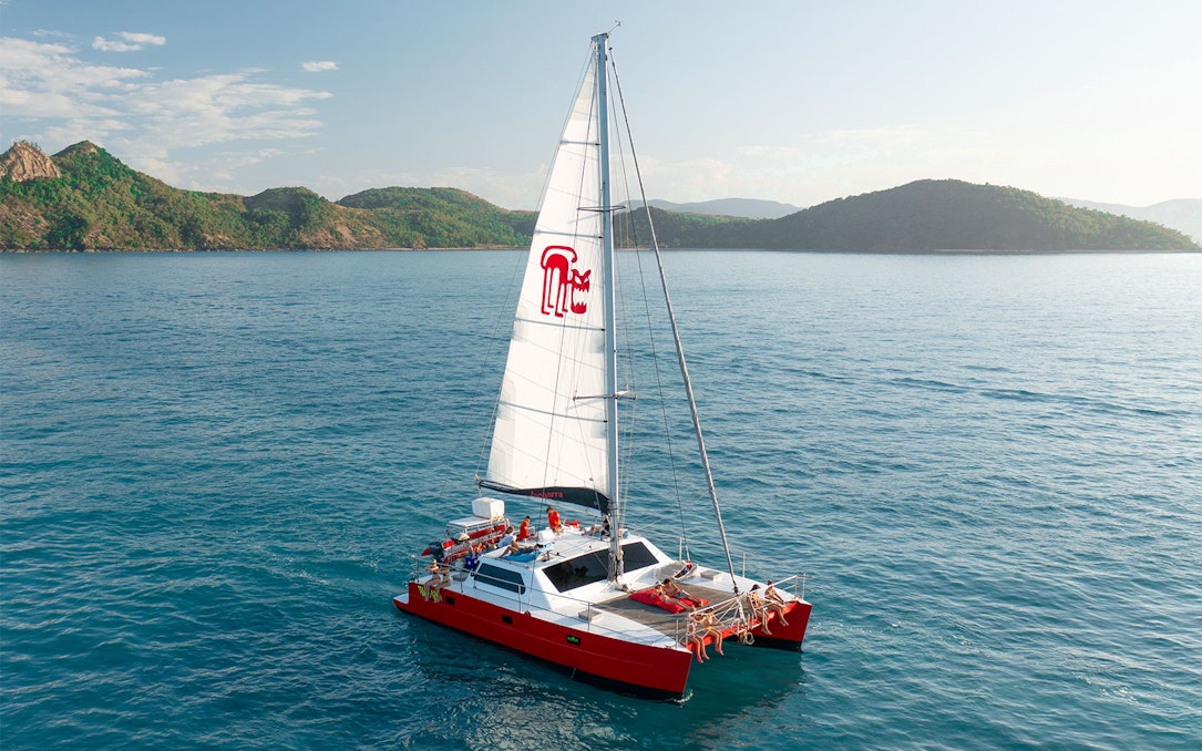 Catamaran sailing near Whitsunday Islands on Tongarra Sail Day Tour.