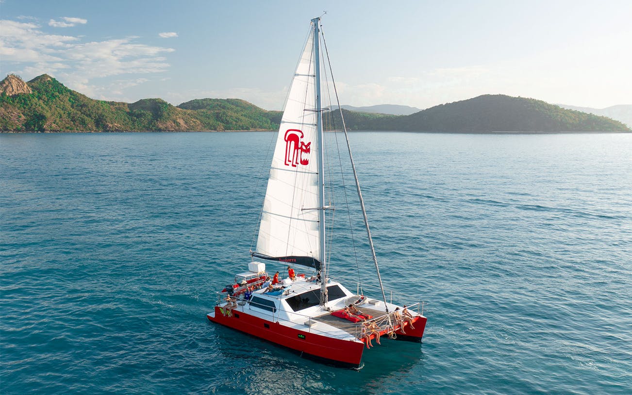 Catamaran sailing near Whitsunday Islands on Tongarra Sail Day Tour.