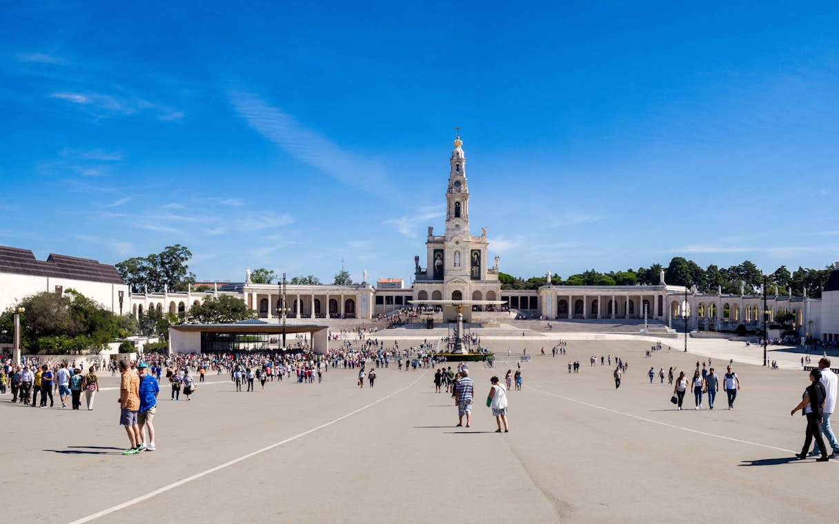 Crowds at Basilica of Our Lady of the Rosary in Fatima Sanctuary, Portugal.