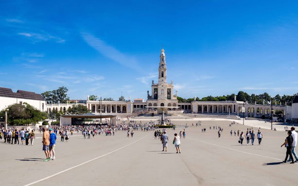 Crowds at Basilica of Our Lady of the Rosary in Fatima Sanctuary, Portugal.