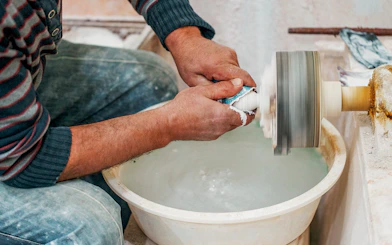 Craftsman shaping pottery on a wheel during Private Green Tour Cappadocia.