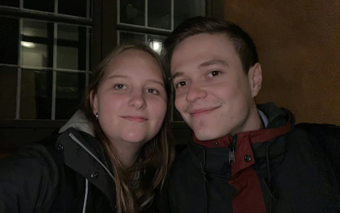Couple enjoying Ghosts of Stockholm self-guided city exploration game.
