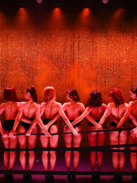 Dancers on stage at Paradis Latin Christmas show in Paris.