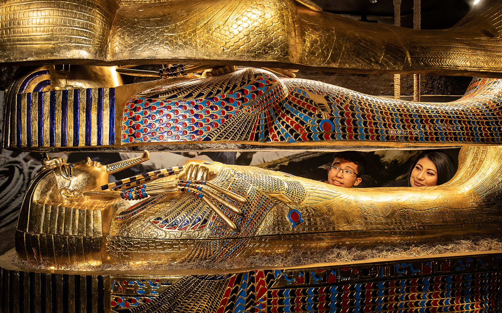 Visitors inside a replica of an Egyptian sarcophagus at a Las Vegas attraction.