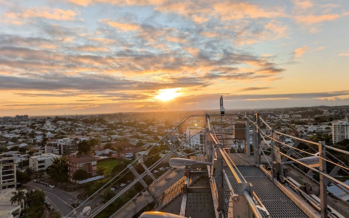 Dawn view from Story Bridge Adventure Climb overlooking Brisbane cityscape.