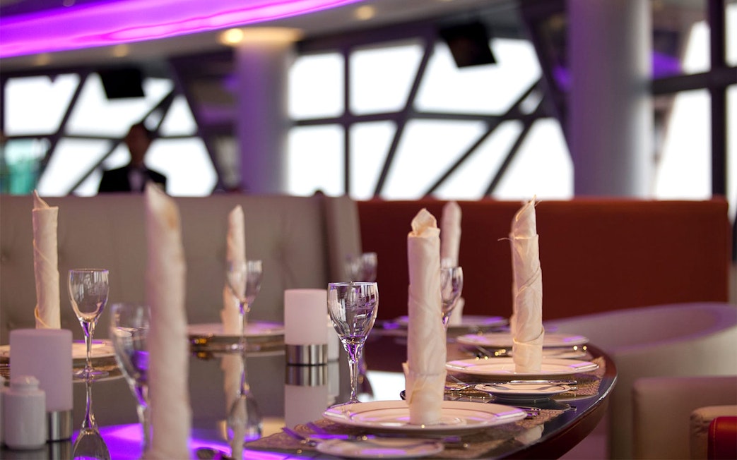 Seating arrangement at Atmosphere 360 restaurant, Kuala Lumpur with elegant table settings.