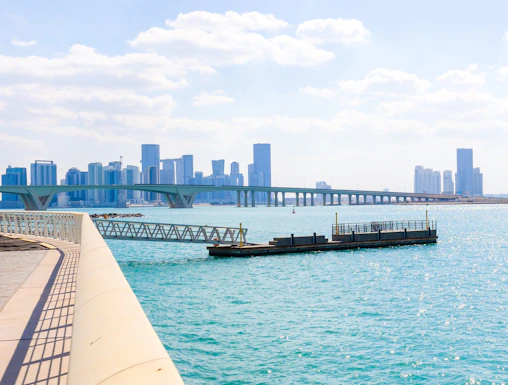 City skyline with towers and skyscrapers viewed from Saadiyat Island, Abu Dhabi.