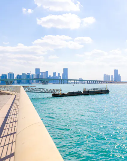City skyline with towers and skyscrapers viewed from Saadiyat Island, Abu Dhabi.