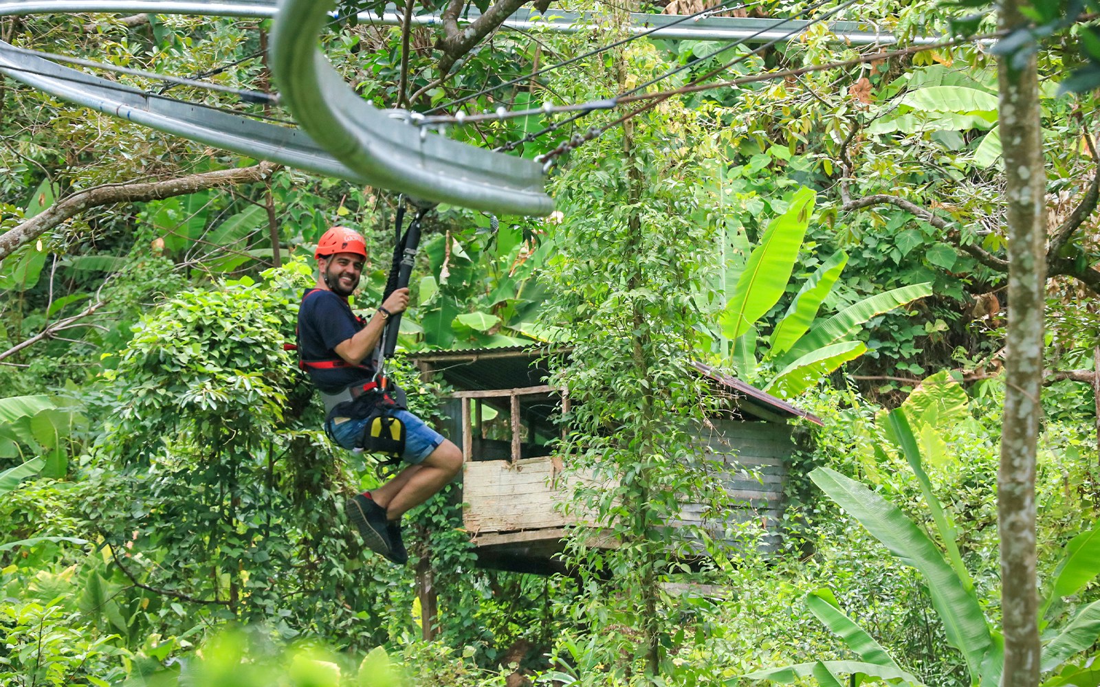 Ziplining through lush jungle at Hanuman World, Phuket.
