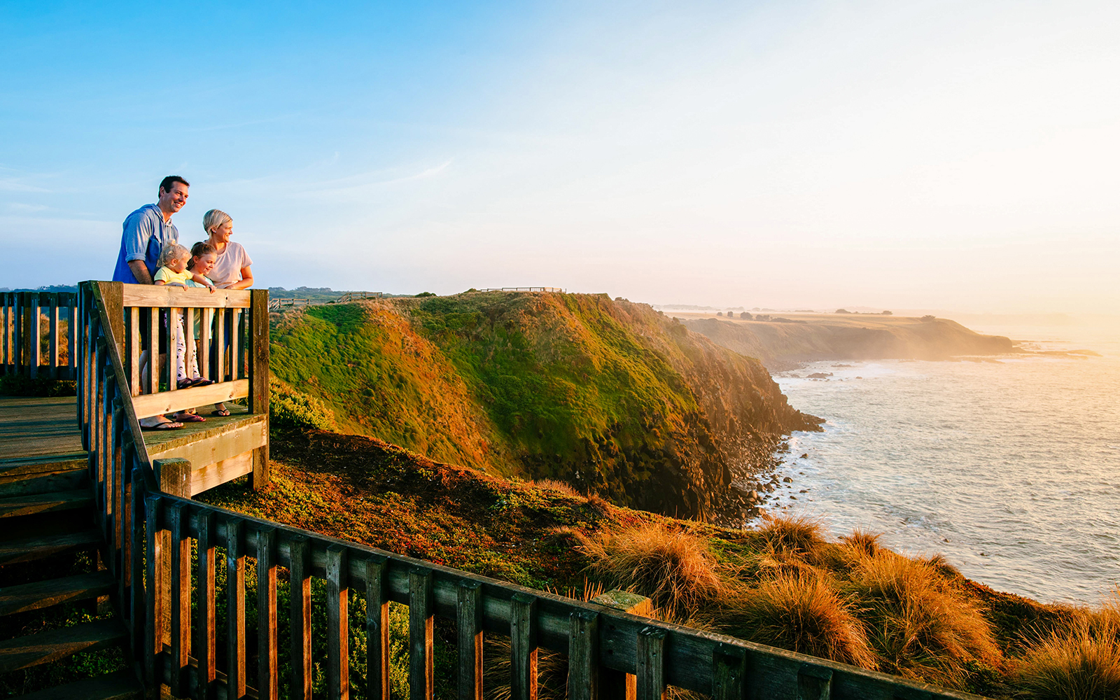 A family watching the sunset from Phillip Island
