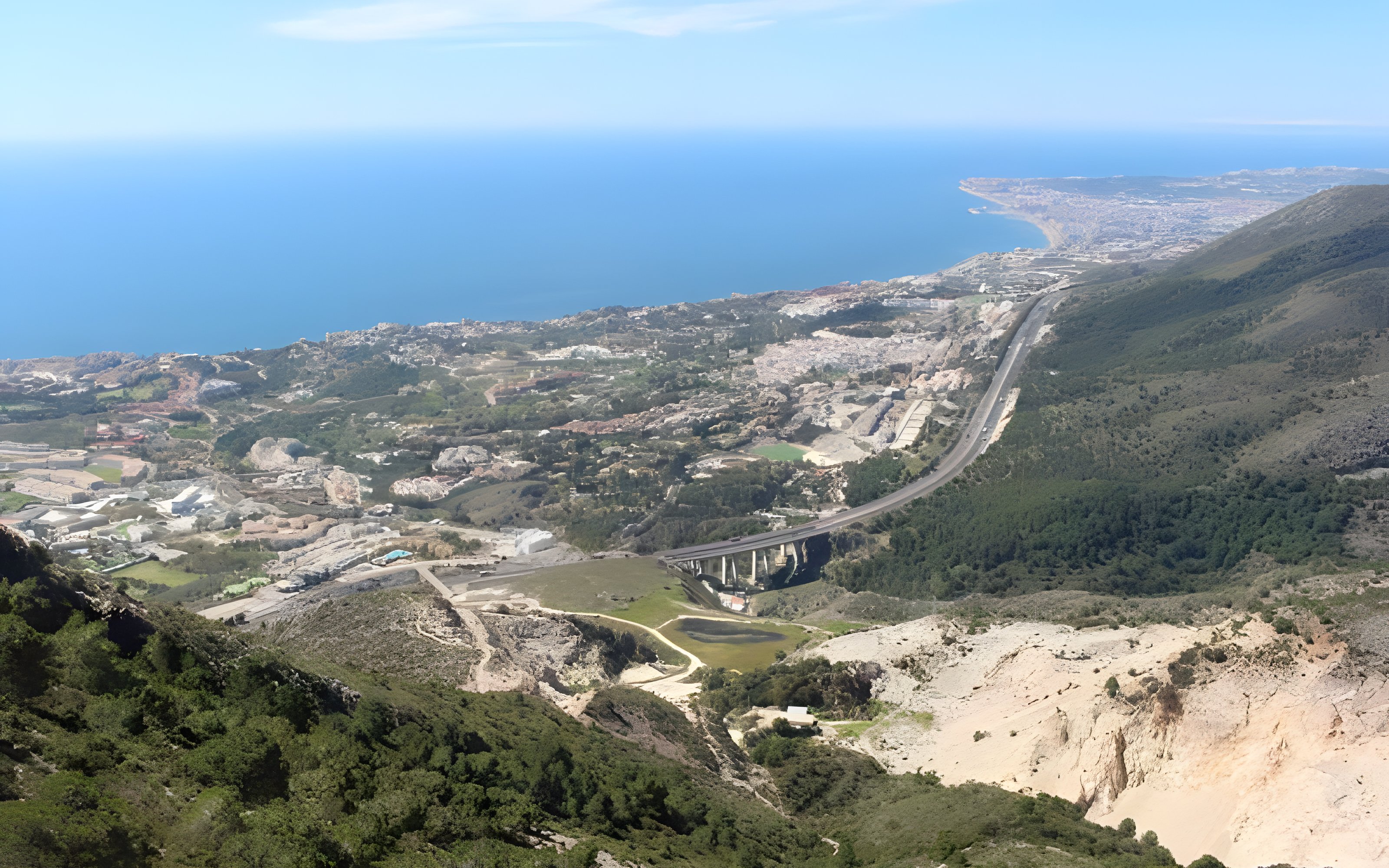 Aerial view from Monte Calamorro overlooking the coastline and landscape of Benalmádena, Spain.
