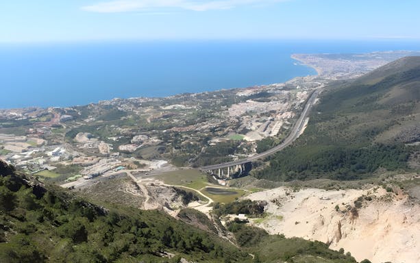 Aerial view from Monte Calamorro overlooking the coastline and landscape of Benalmádena, Spain.