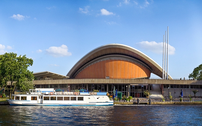 Berlin City Cruise boat in front of Haus der Kulturen der Welt.