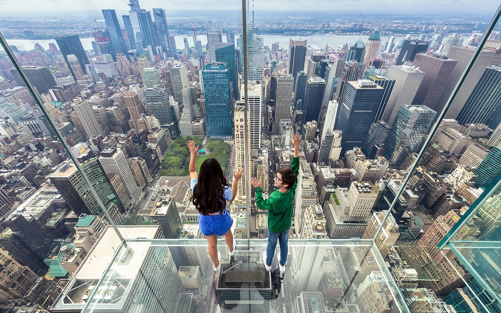Children exploring interactive exhibit inside SUMMIT One Vanderbilt, New York City.