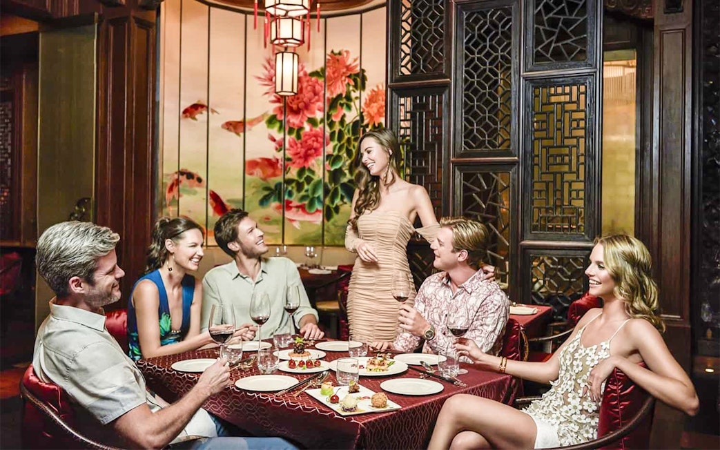 Group dining at Baha Mar Resort restaurant in Nassau, Bahamas.