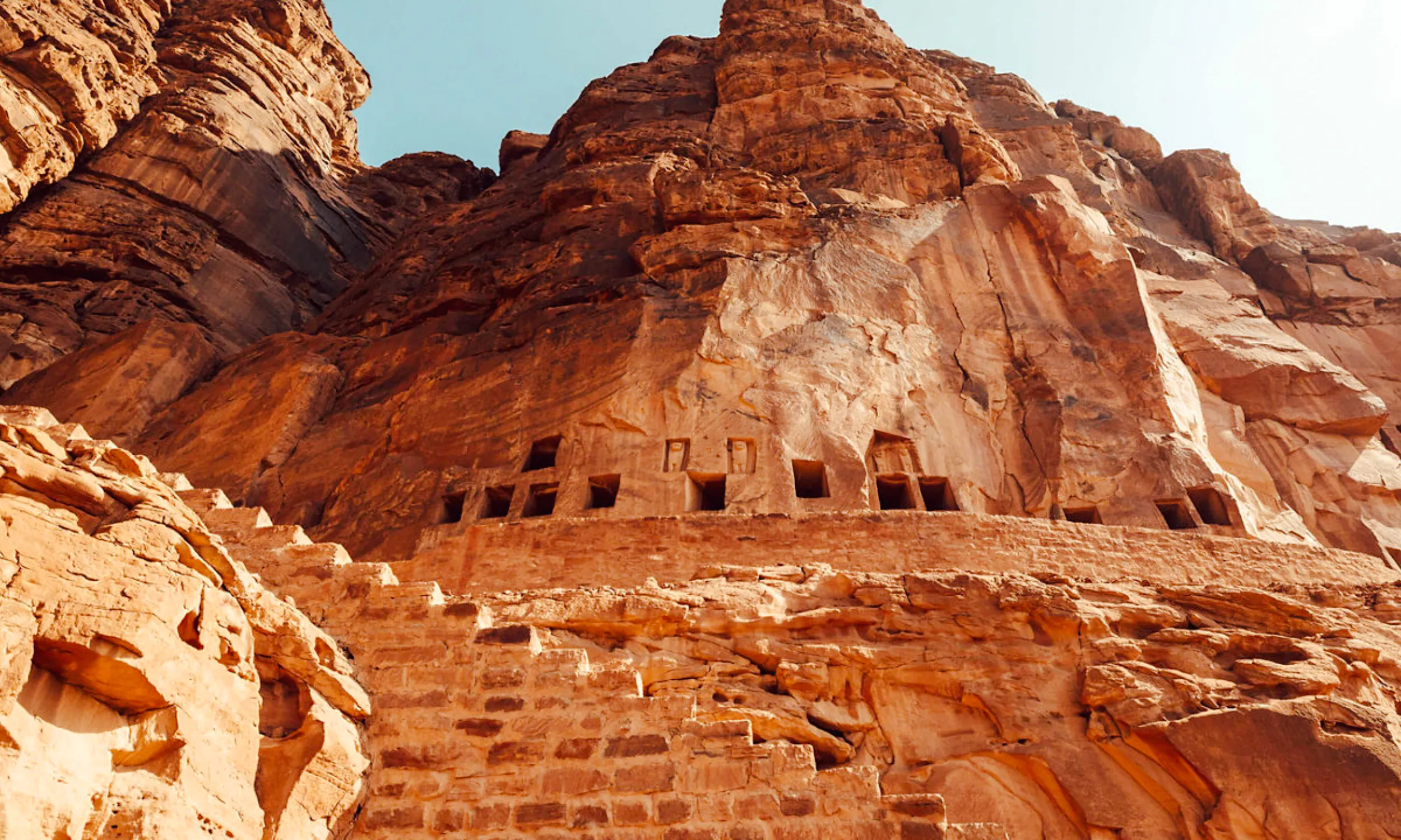 Ancient rock-cut tombs in AlUla, Saudi Arabia, viewed during a private 2-day tour from Medina.
