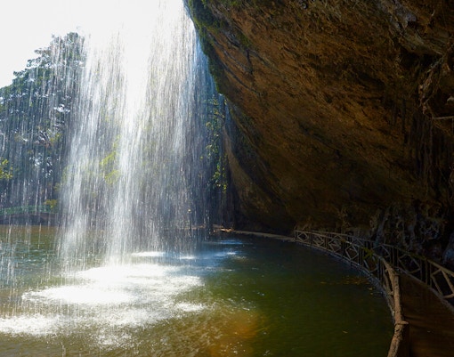 Wooden pathways just a few feet away from the thundering Bridal Veil Falls