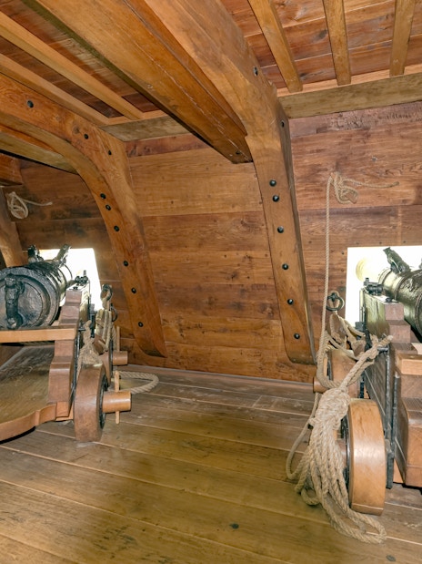 Canons inside a wooden ship at Vasa Museum, Stockholm, Sweden.