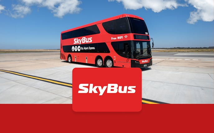Skybus Hobart Airport Shuttle parked on tarmac under blue sky.