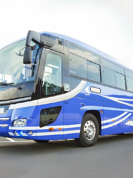 Kansai Airport transfer bus parked at the stop.