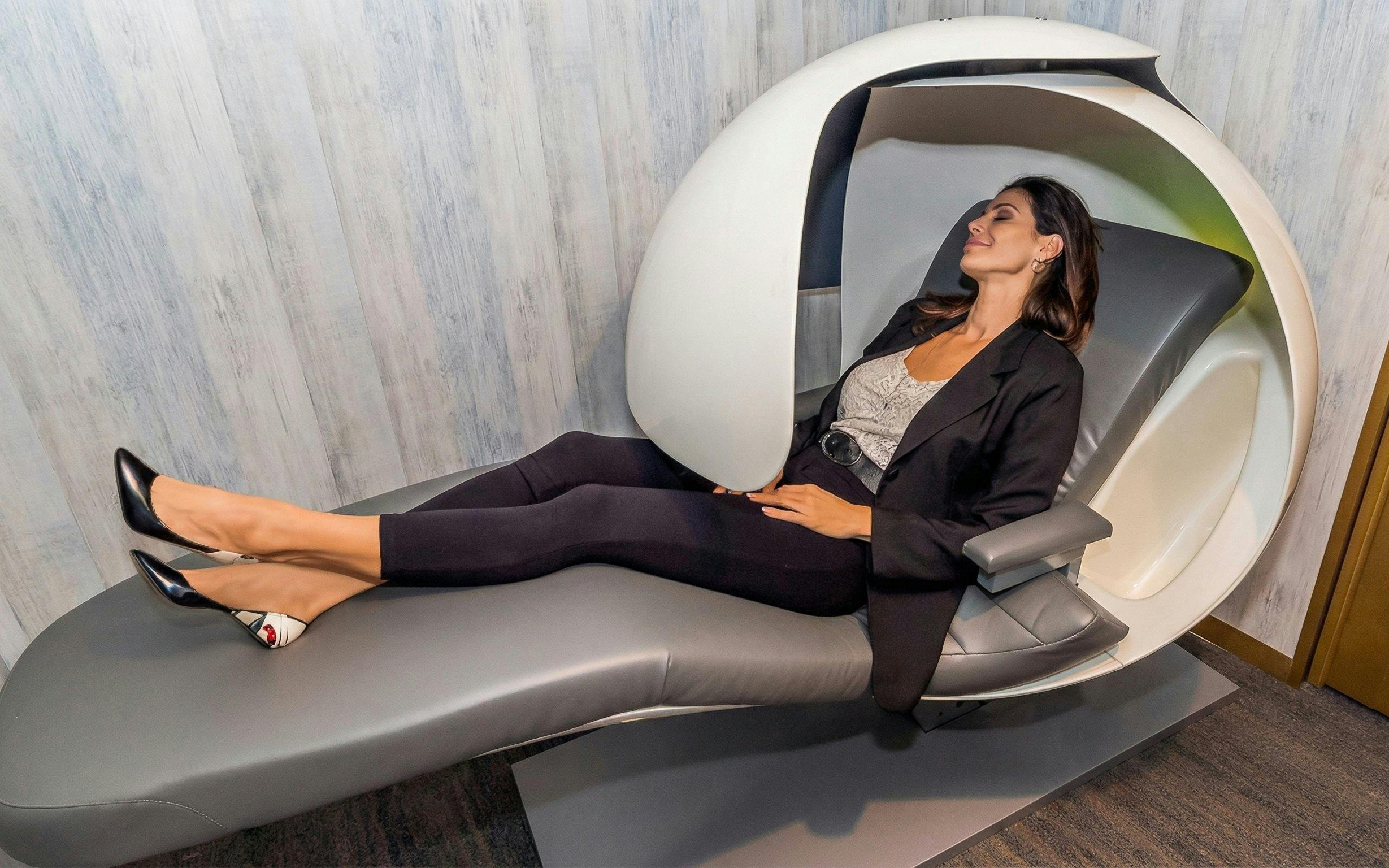 Relaxation pod at Mera VIP Lounge, Cancun International Airport.