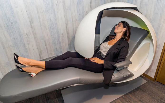 Relaxation pod at Mera VIP Lounge, Cancun International Airport.