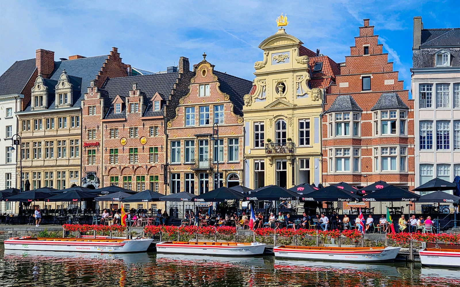 Historic guild houses along the river canal in Ghent, Belgium.