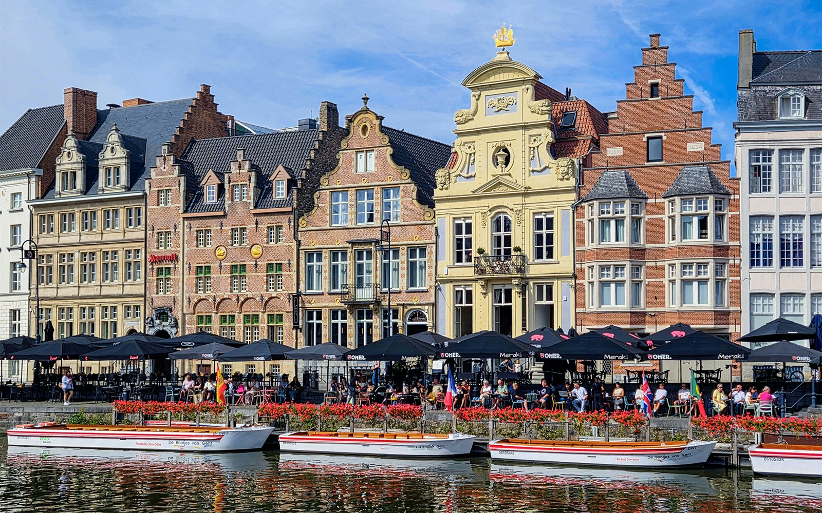 Historic guild houses along the river canal in Ghent, Belgium.