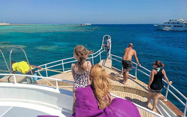 People enjoying a boat tour near Giftun Island, Hurghada.
