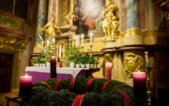 Advent wreath with candles in St. Anne's Church, Vienna, during Magic Trumpet Christmas Concert.