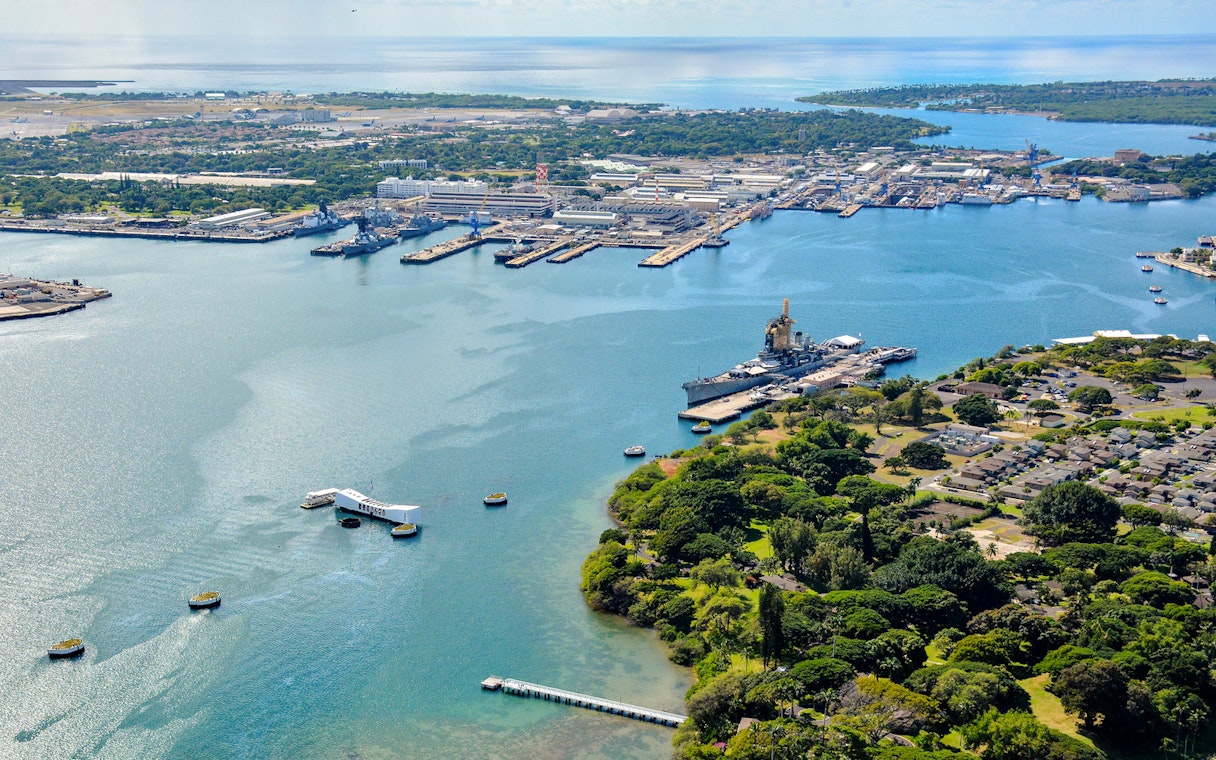 Aerial view of USS Arizona Memorial and USS Missouri at Pearl Harbor, Hawaii.