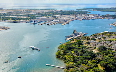 Aerial view of USS Arizona Memorial and USS Missouri at Pearl Harbor, Hawaii.