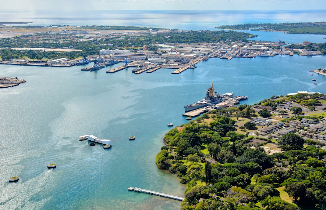 Aerial view of USS Arizona Memorial and USS Missouri at Pearl Harbor, Hawaii.