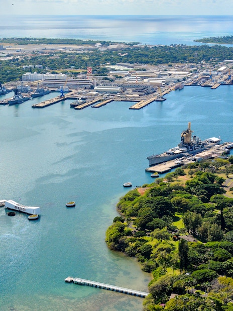 Aerial view of USS Arizona Memorial and USS Missouri at Pearl Harbor, Hawaii.