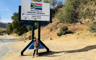 Welcome sign at Sani Pass border control, South Africa, on Mountain Splendor tour from Durban.