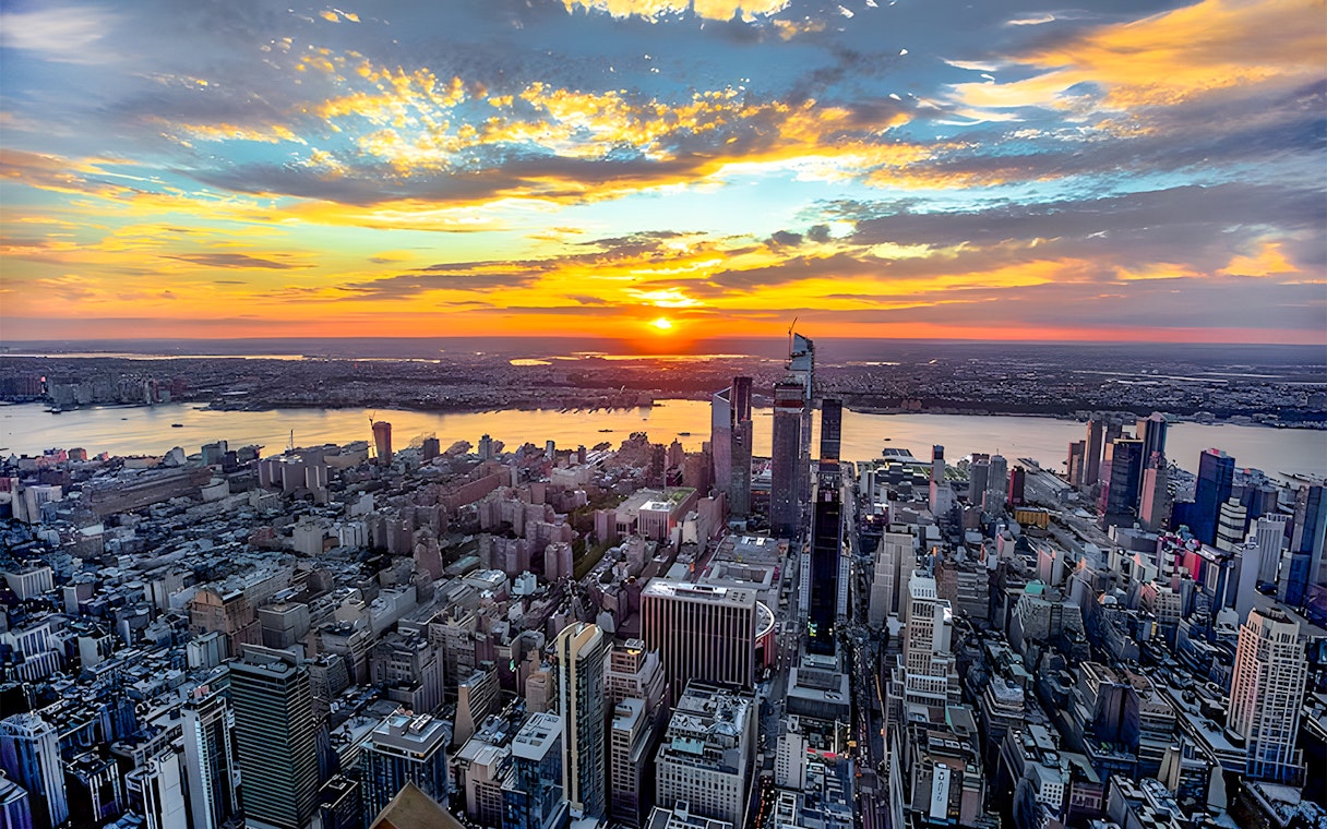 Sunset view over New York City skyline from the Empire State Building.