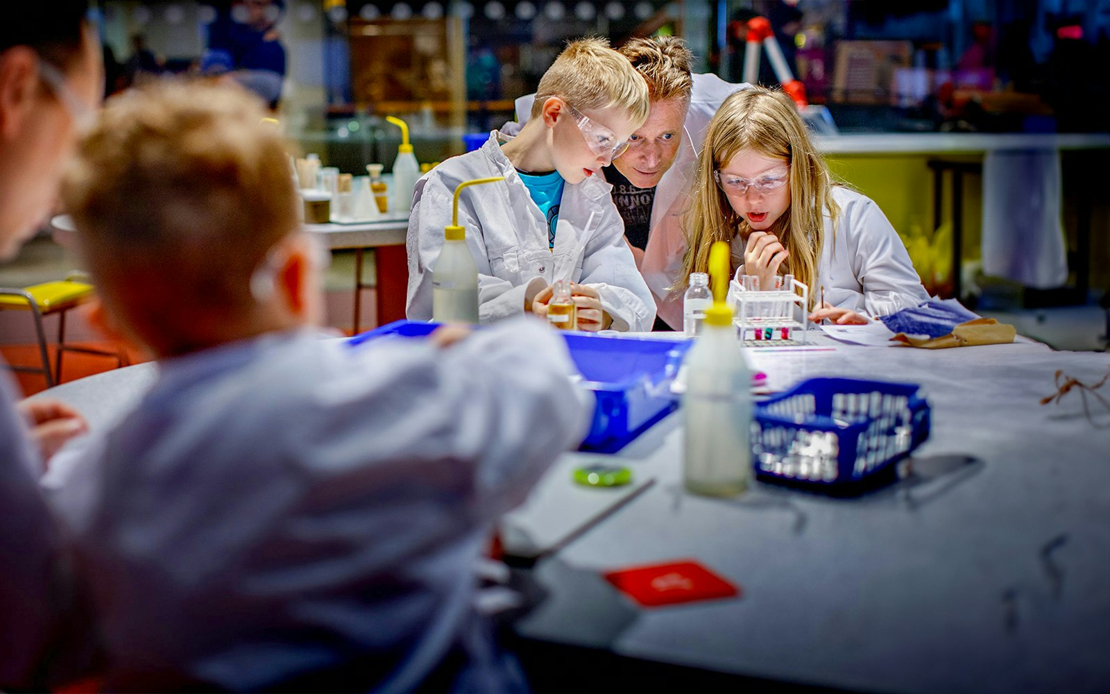 Children conducting experiments at NEMO Science Museum, Amsterdam.
