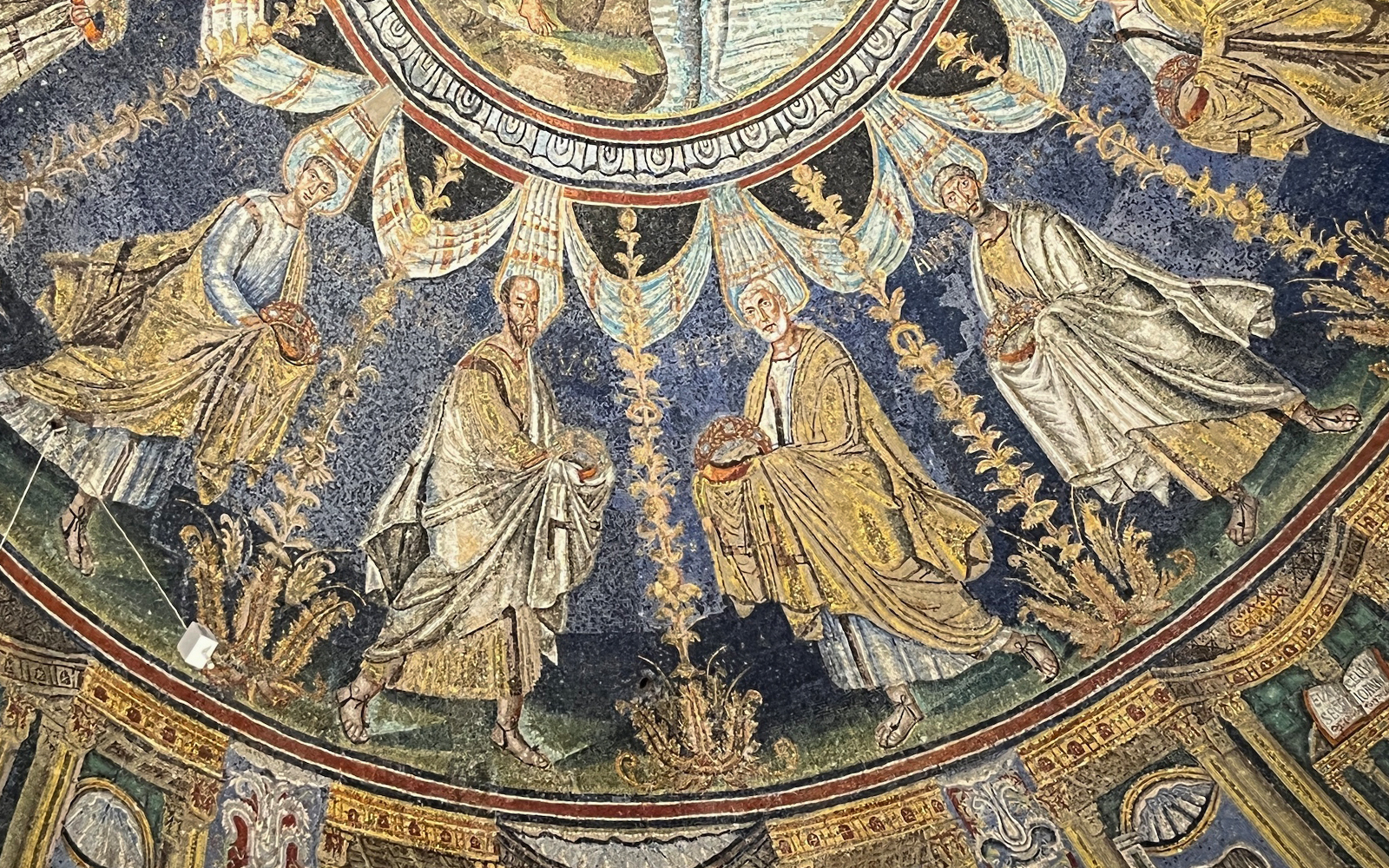 Mosaic of saints in Ravenna UNESCO monument tour.