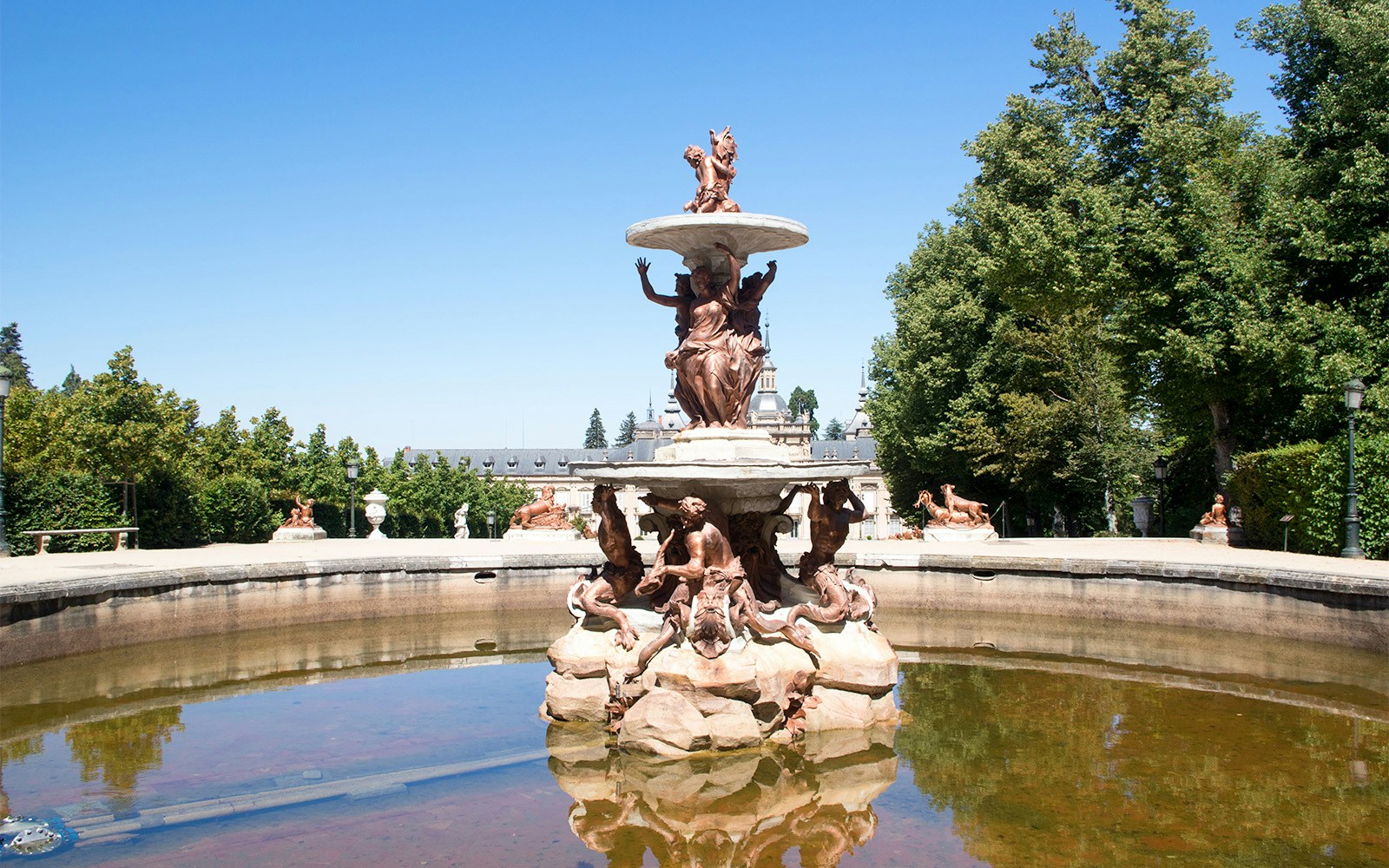 Royal Palace of La Granja de San Ildefonso with ornate gardens and fountains in Segovia, Spain.