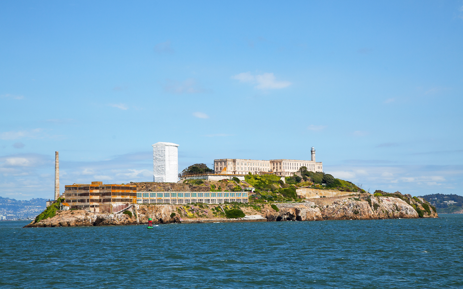 San Francisco Big Bus tour with view of Alcatraz Island in the background.