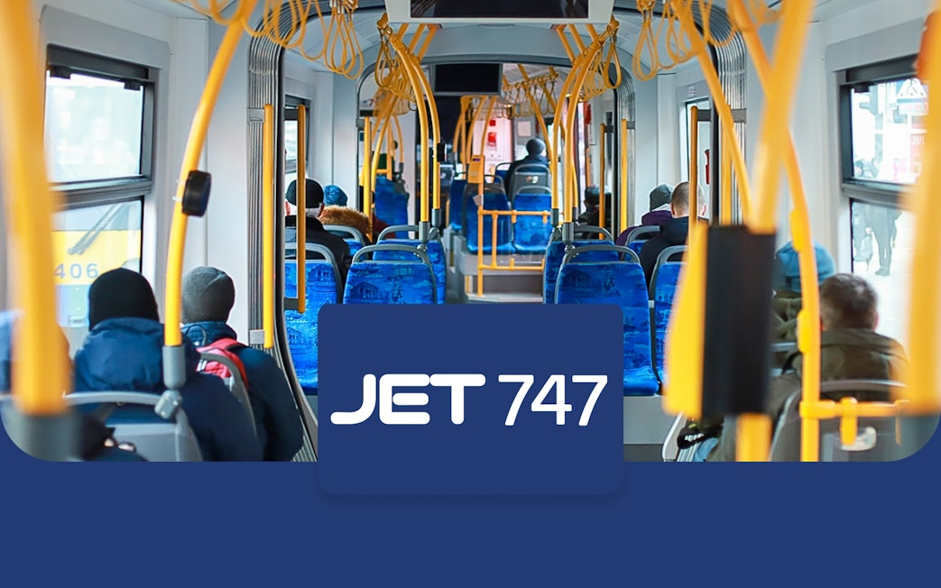 Passengers seated inside a JET 747 bus from Edinburgh Airport to Halbeath Park & Ride.