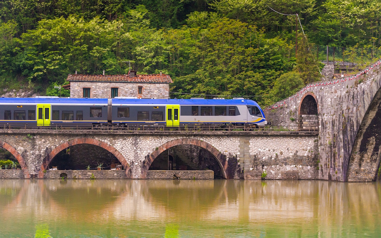 Trenitalia train crossing Devil's Bridge from Pisa to Florence.