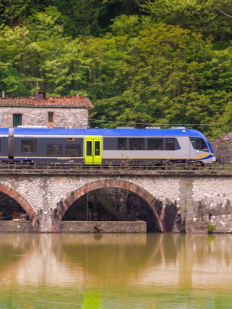 Trenitalia train crossing Devil's Bridge from Pisa to Florence.