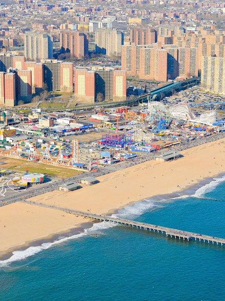 Aerial view of Coney Island beach and amusement park in New York City.